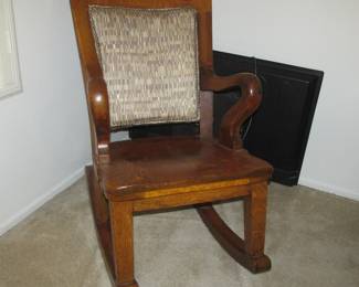 Absolutely stunning solid oak rocking chair in mint condition.