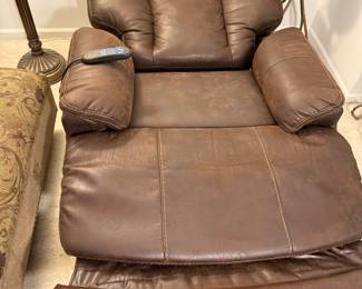 Top of the line. Bob’s motorized power recliner. Push button electric reclining works perfectly.Power adjustable lumbar and headrest.