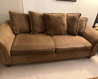 Beautiful sofa with matching chair and coordinating ottoman are offered in excellent condition. All Cushions are reversible, allowing for even wear an extended life.