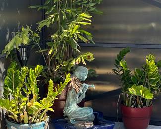 Bronze Figurine of a Girl Playing a Flute