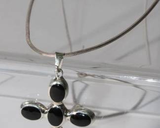 .925 Sterling Silver Cross Pendant and Chain Cross features 6 oval black onyx cabochons and measures approx 2" long and just over 1" wide, chain measures approx 18" long and total weight for both is 11.3 grams