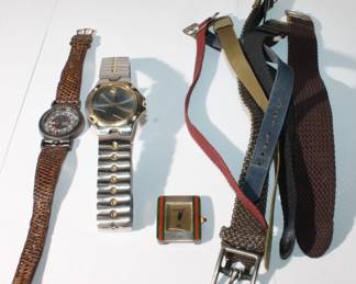 Group of three Men's Designer Watches and watch bands, watches Gucci in sterling, Movado and Timberland all need servicing, along with 7 loose bands all for one money