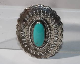 .925 Sterling Silver Native American Tourquoise Pendant/Brooch, over 2" long and 1.5" wide with oval tourquoise in center, 22.5 grams total weight