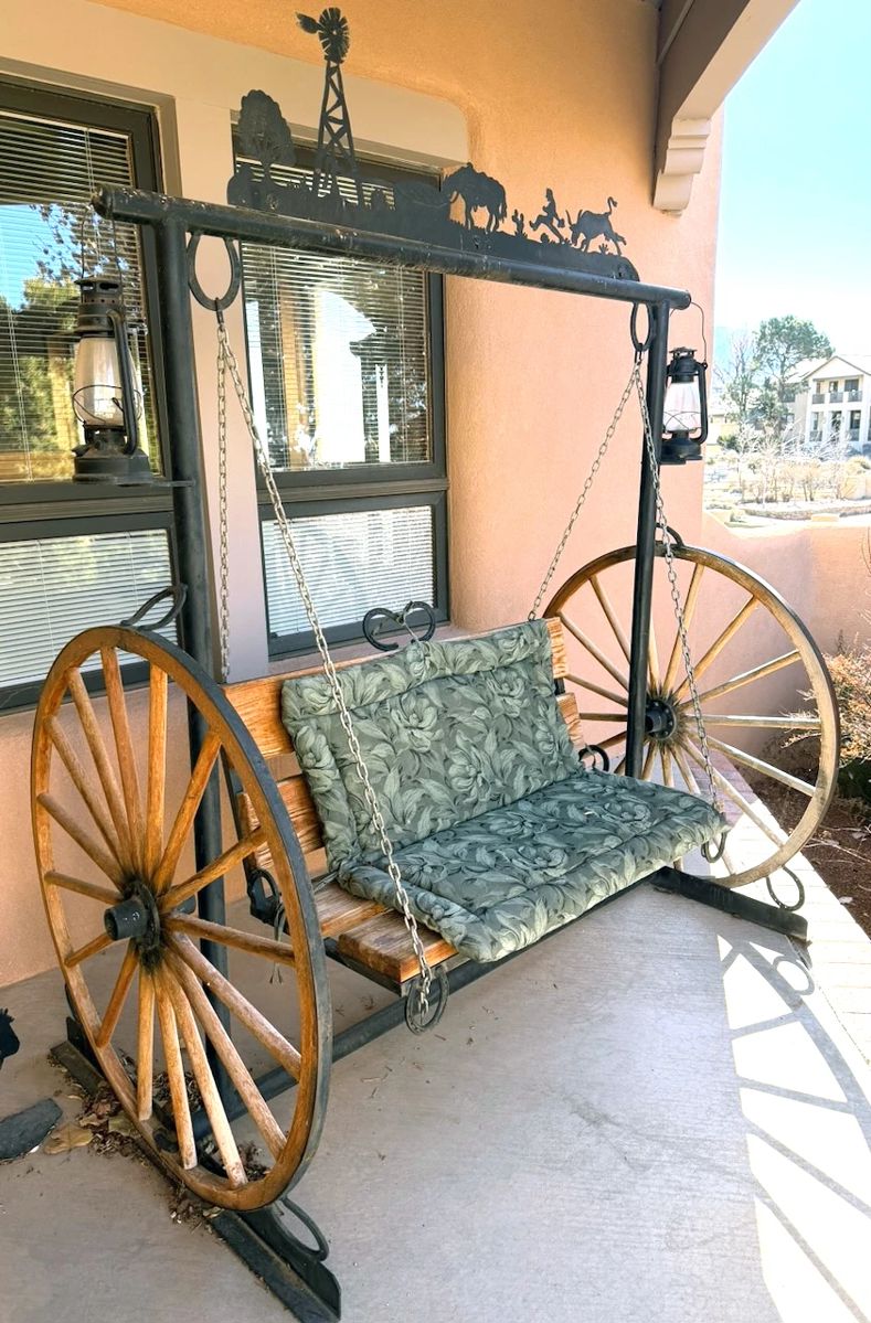 Wagon wheel porch swing