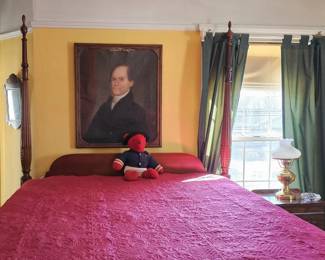 Antique Mahogany Poster Bed. Featuring (4) tall vertical columns ending in decorative finials.