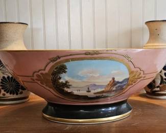 Large antique porcelain bowl, probably French, featuring a pink exterior ground with an oval medallion depicting a pastoral landscape scene. Excellent condition.