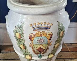 Nice Pair of Italian Faience Majolicaware Albarellos, circa mid twentieth century. Each of large size, centered with a coat of arms, framed by rows of lemons.
