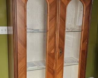 Antique French Walnut Vitrine Cabinet, with carved floral decoration and arched doors.