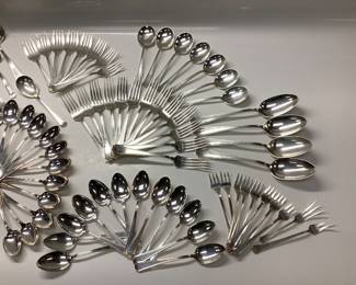 107pc STERLING GORHAM FAIRFAX PATTERN FLATWARE SET THIS LOT FEATURES GORHAMS ART DECO FAIRFAX PATTERN ON FINE STERLING SILVER FLATWARE. A CLASSIC INVESTMENT FOR ANY HOME AND CONTRIBUTES TO GENERATIONAL WEALTH. WEIGHTS ARE AS FOLLOWS. SOLID STERLING FLATWARE 3211.43 GRAMS, 7.08 lbs. FLATWARE W/ STERLING HANDLES 1043.26 GRAMS, 2.3 lbs. TOTAL COMBINED WEIGHT 4254.7 GRAMS, 9.38 lbs.