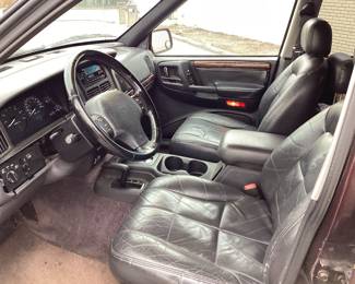 1996 Jeep Grand Cherokee VIN: 1J4GZ78Y9TC212836 Miles: 182443 Engine: 5.2 Color: BURGUNDY 1996 Jeep Grand Cherokee 5.2 Liter 4x4. Mileage 182,443 Power Accessories, Reese Hitch, Wired For Trailer. Has Signs Of Wear And Repair To Interior And Fading Paint Due To Age. Clean Title