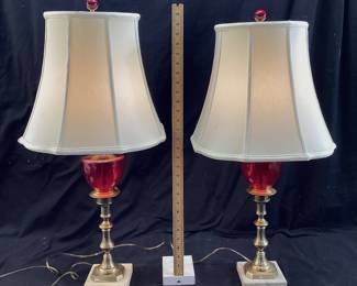 2 VTG BRASS CRANBERRY GLASS TABLE LAMPS THESE LAMPS FEATURE 3 WAY SWITCHES AND ADJUSTABLE HARPS. NO SHIPPING PICKUP ONLY