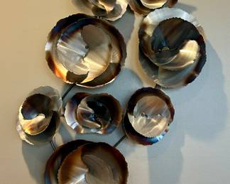 Metal wall sculpture (burnished flower circles)