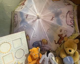 Classic Pooh animals, picture frame, child’s umbrella 