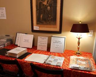 Our Collector Room featuring sports cards, comics, historical books and documents, and designer accessories.