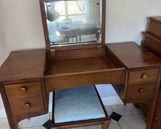 Vanity with mirror and chair 
