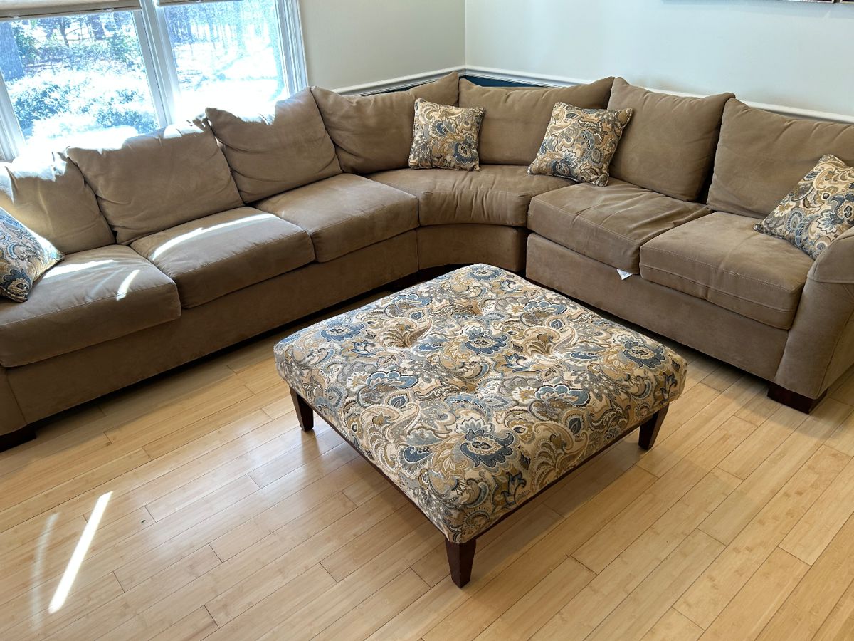Available for early sale.  $500.  Sectional sofa with ottoman and matching pillows.