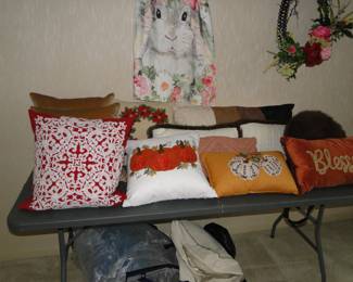 A fine collection of throw and decorative pillows too