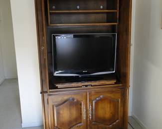 A hutch that houses all your entertainment items