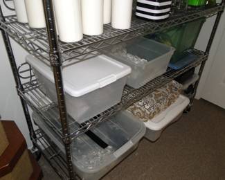 Bins filled with smaller vases, and smaller decorative items