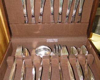 Silverware chest complete with silverware, Rogers Brother's complete service for eight including children's pieces as well.  Garland is the pattern