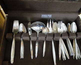 Silverware chest complete with silverware, Rogers Brother's complete service for eight including children's pieces as well.  Garland is the pattern