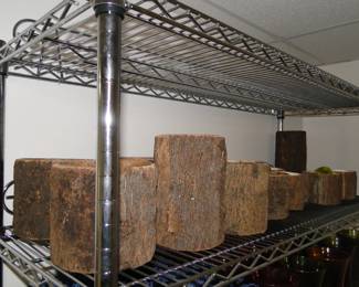 Each one of these is a glass vase, wrapped in real bark