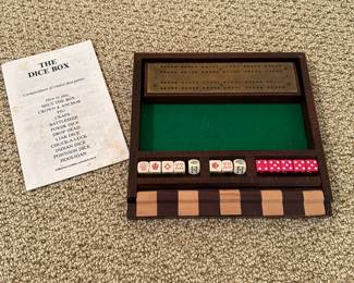 R89 - $30. The Dice Box Game with cribbage board (wood & brass)