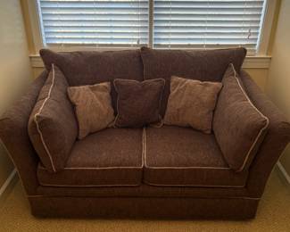 R7 - $175. Brown Tweed Fabric Loveseat with Shelter Arms and Contrast Piping. On Wheels. Excellent Condition. Measures 58" wide x 35" deep x 33" tall. 