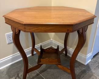 R43 - $150. Edwardian Octagonal 2 Tier Occasional table. Measures 30" x 29.25" x 26.75" tall. Top has a significant split on it from age. Table is still sturdy with beautiful lines!