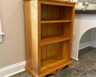 R65 - $40. Small Pine Bookcase or storage. Shelves are NOT adjustable. Measures 24" wide x 12" deep x 36" tall. 