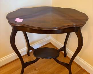 R26 - $125. English Mahogany Oval Shaped Table with Carved Legs. Top measures 27" x 18" x 27.75" tall. Solid and very sturdy. 