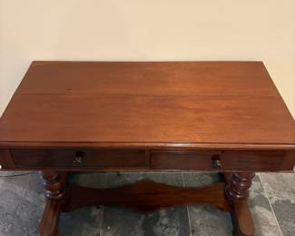 R35 - $450. Antique English Writing Desk / Entry Table. Measures 41" wide x 21" deep x 29" tall. Drawers both slide easily. Top has pulled apart a little bit with age where the boards were originally connected - you don't really notice unless it's empty. Could work as a desk, sofa table or entry table. 