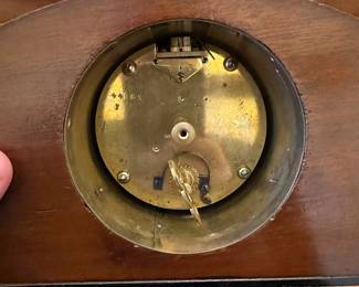 R80 - $75. Satinwood Mantle Clock with 4 brass feet. WORKS! French Movement. Measures 9.5" wide x  3" deep x  5.5" tall. 