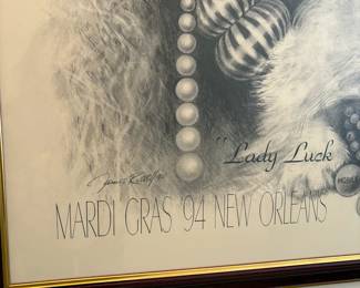 R9 - $50. Framed "Lady Luck" Mardi Gras '94 New Orleans. James Russell. Measures 26" wide x 38" tall. 