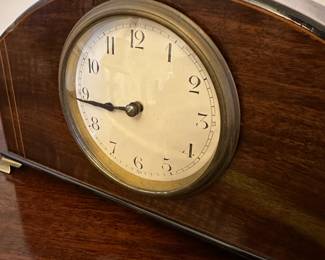 R80 - $75. Satinwood Mantle Clock with 4 brass feet. WORKS! French Movement. Measures 9.5" wide x  3" deep x  5.5" tall. 
