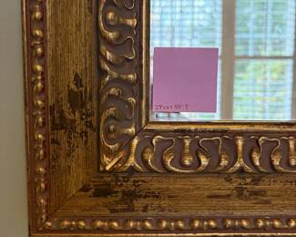 R48 - $45 Gold Framed Wall Mirror. Measures 27" wide x 37" tall. 