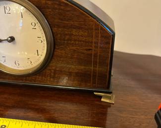 R80 - $75. Satinwood Mantle Clock with 4 brass feet. WORKS! French Movement. Measures 9.5" wide x  3" deep x  5.5" tall. 