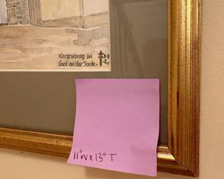 R107 - $30. Framed Print Titled "Kirchenburg in Saal an der Saale". Measures 11" x 13" tall. 