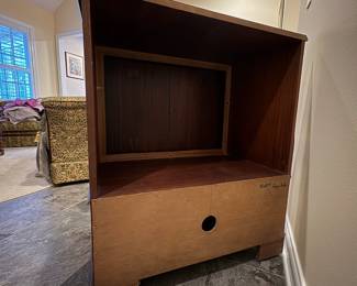 R41 - $95. Vintage TV Cabinet. Measures 30" wide x 18.75" deep x 35" tall. Top doors open. Bottom folds down and has a pull out tray. Would work for a record cabinet Doors are flamed wood with inlay. 