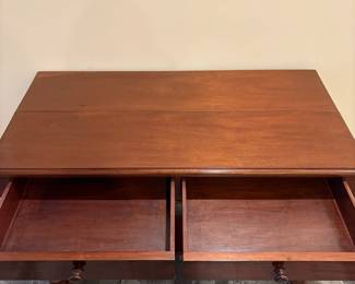R35 - $450. Antique English Writing Desk / Entry Table. Measures 41" wide x 21" deep x 29" tall. Drawers both slide easily. Top has pulled apart a little bit with age where the boards were originally connected - you don't really notice unless it's empty. Could work as a desk, sofa table or entry table. 