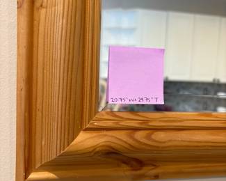 R66 - $25. Pine Framed Mirror. Measures 20.75" x 24.75". 