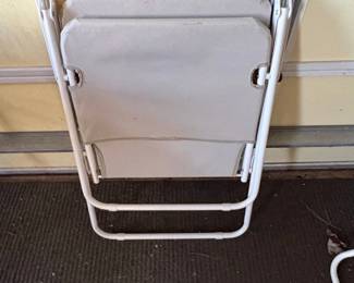 Gray Folding Chair with White Metal Frame