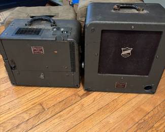 Bell & Howell film sound Speaker and projector. With fabric cover.
