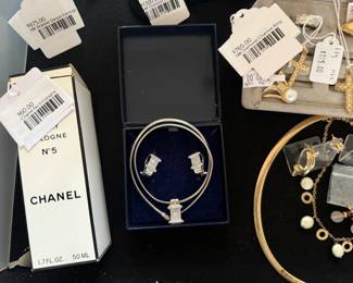 Channel No. 5 Cologne, 14k Braided Dangle Earrings, 14k Diamond Channel Rings , Precious metal pricing is subject to change based on market fluctuation.