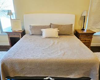 King restoration Hardware upholstered slip cover king bed. Mattresses included. Linens are also restoration Hardware (sold seperately)