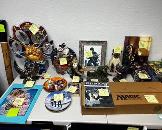 Collector Lot Magic The Gathering Marvel Sci Fi and Limited Artwork  Magic The Gathering  Official Magic The Gathering long storage collector box 2017 Comic Con exclusive   Marvel Infinity Gauntlet collector display set multi figure blister display Fantasy and wizard figurines Dragon sculpture with wizard figure Gothic and occult themed decor pieces Fantasy character framed print Beatles collector plates decorative music memorabilia Additional pop culture display items  Limited and Signed Art  Signed fantasy art print framed Additional framed fantasy and sci fi prints Decorative Egyptian revival papyrus artwork Convention sourced artwork  Some pieces are signed and or numbered.  Additional Highlights  Didgeridoo authentic Comic and fantasy book stack Genre display decor Collector plates and specialty items