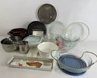 Assorted Bakeware and Pyrex Mixing Bowls with Measuring Cups and Glass Dishes