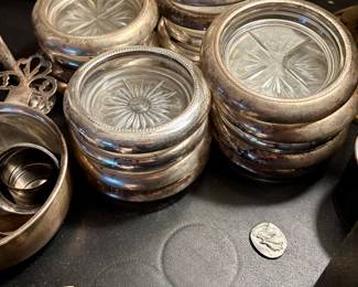 Sterling silver rimmed coasters. 