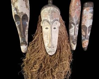 Stunning Set of Four Elongated African Fang NgilStyle Wood Ceremonial Masks
