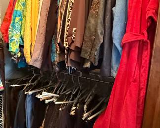 Assorted Women's Clothing and Robes in Closet